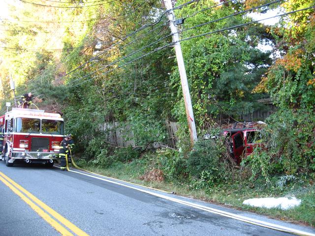 Engine 247 pulls up to a MVA with extrication on Rt.100 - Photo Courtesy of JT Camp