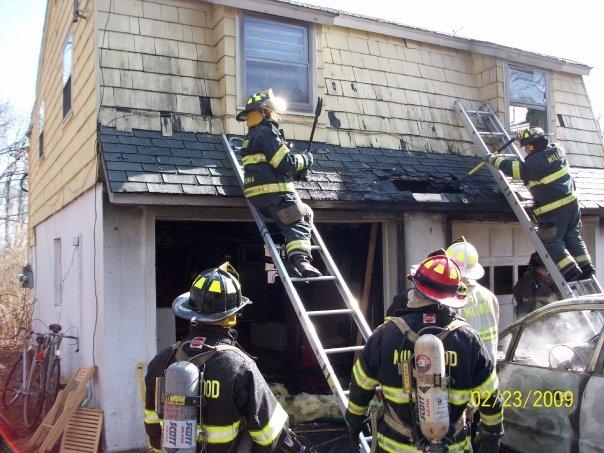 Millwood Firefighters working at a house fire on Pinesbridge Road